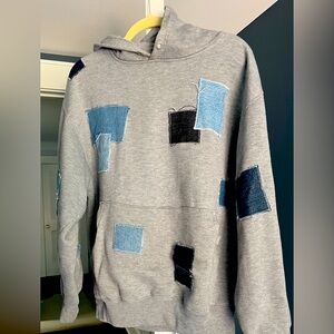 Grey thick hoodie restyled in NYC by Rose and Wilde…used and vintage clothing.